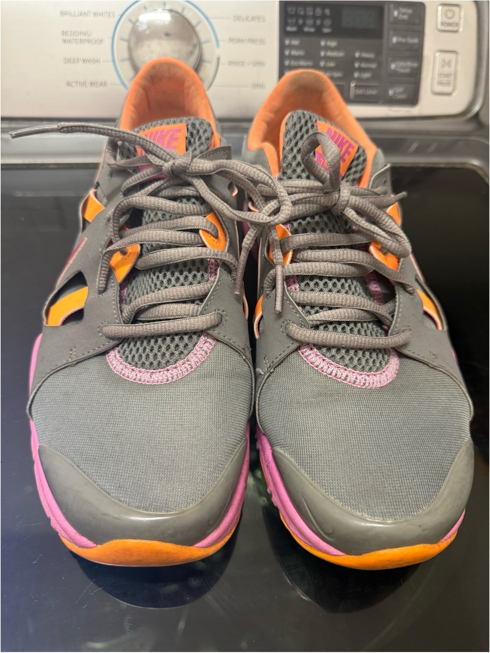 Nike Women's Gray Mesh Athletic Sneakers with Orange and Pink Accents